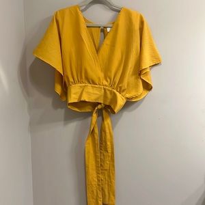 Yellow flare sleeve crop top with tie back